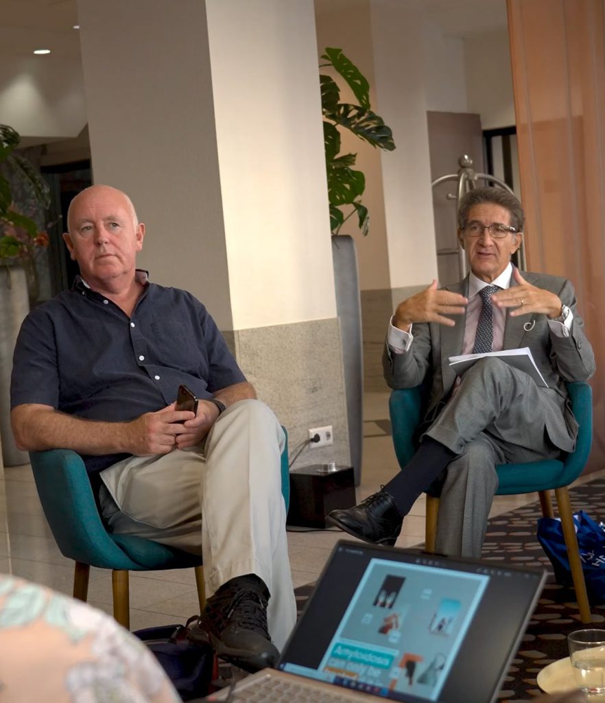 Two Alliance representatives in discussion at a working session